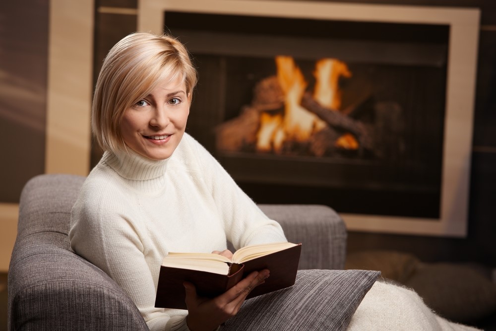 Woman Fireplace book Heilman