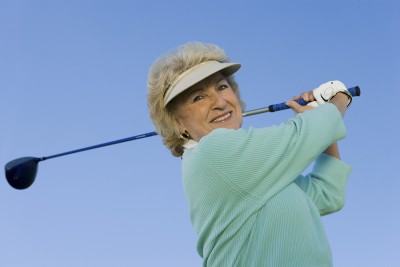 Donna is able to golf again after treatment at the Heilman Center. 